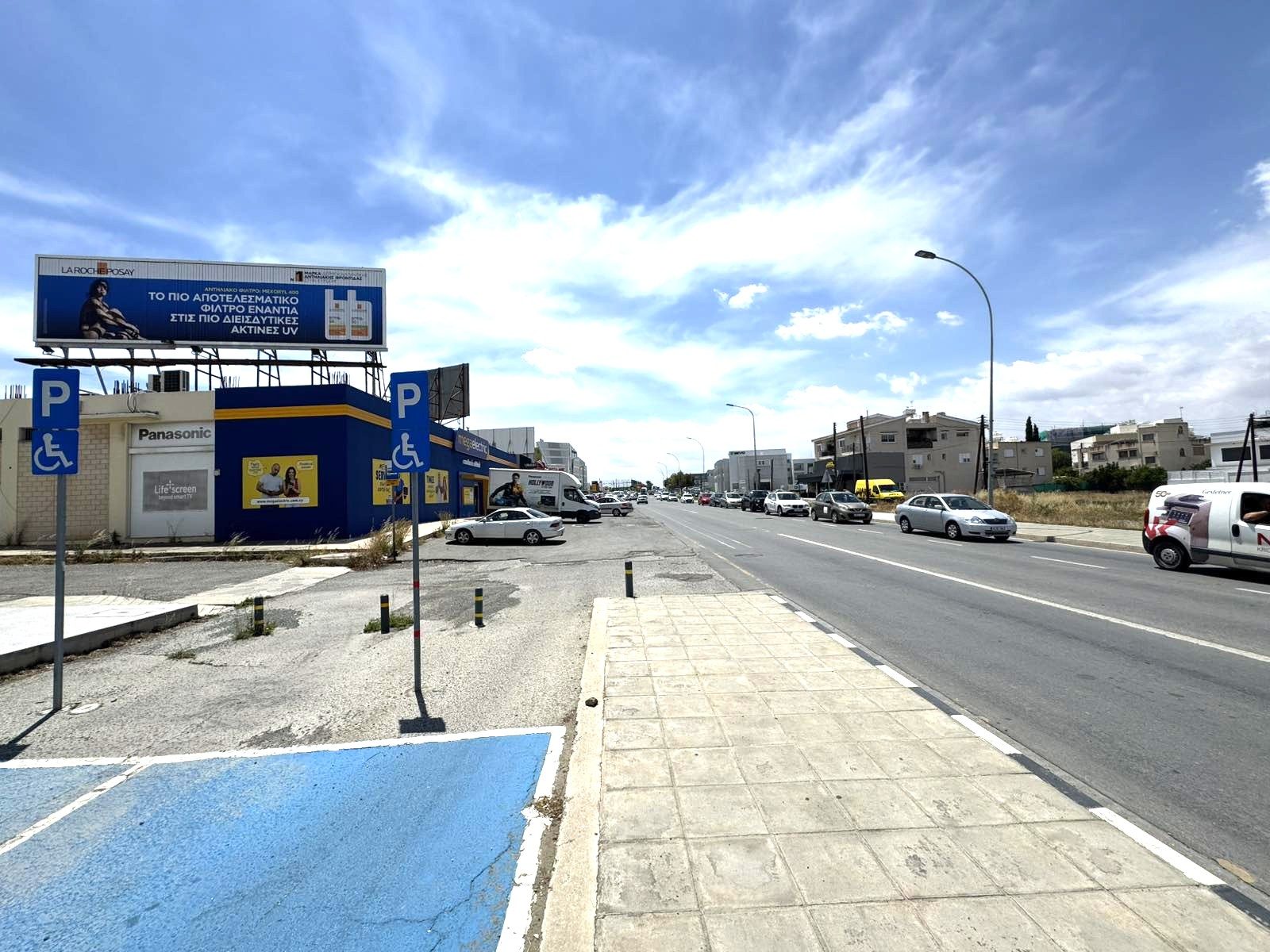 TEMCO billboard — Urban rooftop